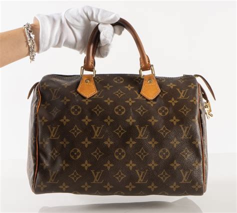 borsa louis vuitton bauletto non originale|louis vuitton false product id.